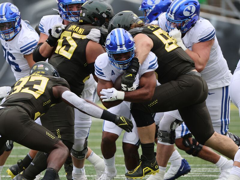 BYU running back Christopher Brooks runs against Oregon at Autzen Stadium in Eugene on Saturday, Sept. 17, 2022.