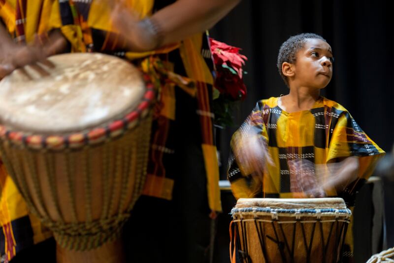 The The Nefertari African Dance/Drum Company performs Monday, Dec. 26, 2022, at the Wisconsin Black Historical Society, in Milwaukee. Kwanzaa, a weeklong cultural celebration honoring African-American culture and African heritage, begins on Dec. 26 and ends Jan. 1.