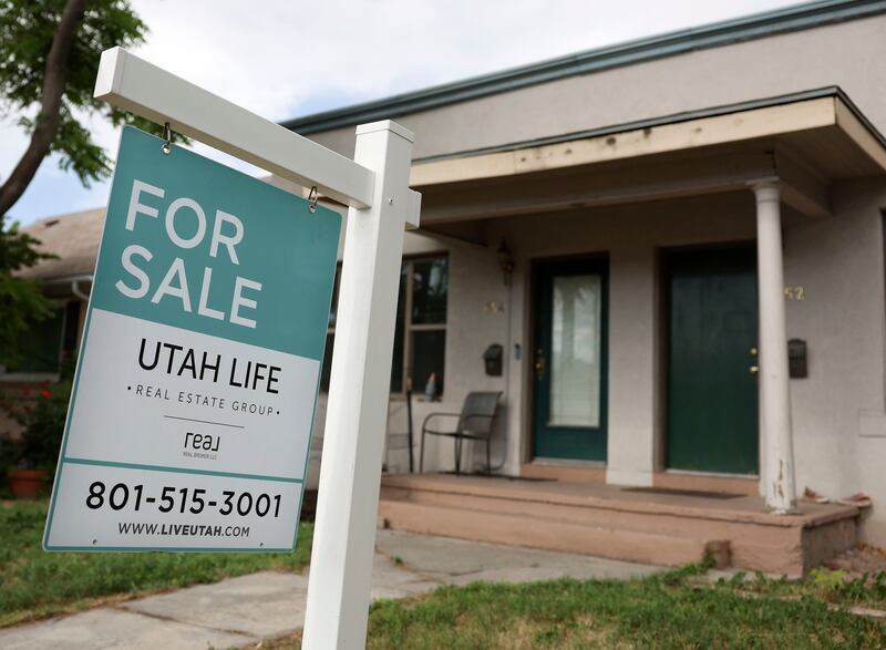 A “For Sale” sign is posted on a property in Salt Lake City on Wednesday, June 29, 2022.