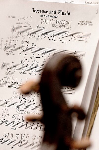 Students perform "Berceuse and Finale" by Igor Stravinsky with Thierry Fischer, music director of the Utah Symphony, at Cottonwood High School in Murray on Thursday, March 14, 2019. High school orchestras across the state are rehearsing the same piece and