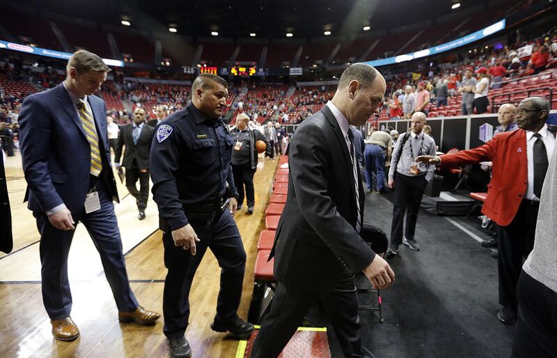 Utah State Aggies head coach Tim Duryea walks off the court following the game against the New Mexico Lobos during the Mountain West Conference basketball tournament in Las Vegas on Friday, March 9, 2018.