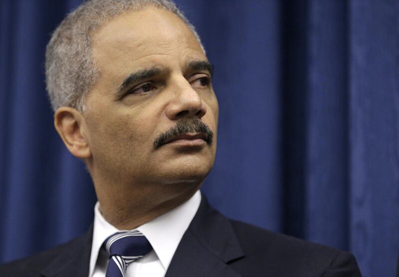 FILE - In this Thursday, Dec. 4, 2014, file photo, U. S. Attorney General Eric Holder speaks during a news conference before a roundtable meeting in Cleveland. New racial profiling guidelines are being announced by the Obama administration that would exem