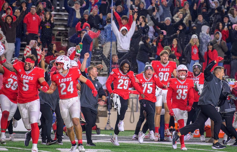 University of New Mexico players rejoice after upsetting Washington State during a game Saturday, Nov. 16, 2024 in Albuquerque, N.M.