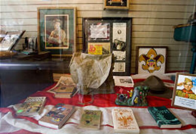 Boy Scout memorabilia lines the front windows of B. Ashworth's on Center Street in Provo on Tuesday.