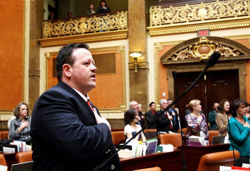 Rep. Carl Wimmer, R-Herriman, joins in the Pledge of Allegiance. He has become Utah's point man on states' rights.