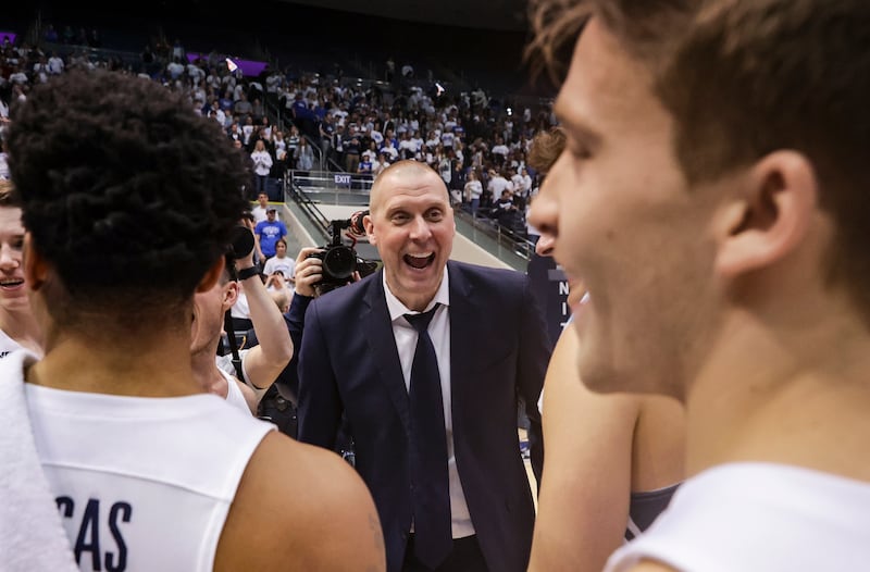 Brigham Young Cougars head coach Mark Pope smiles.