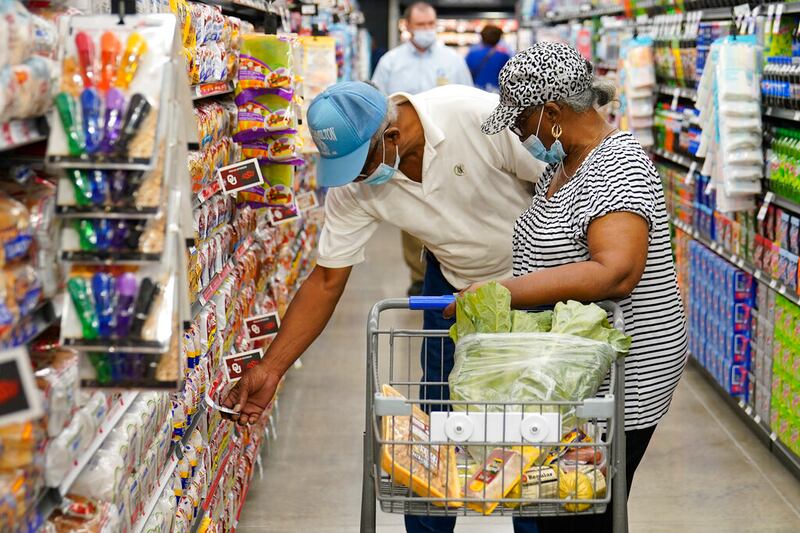 Ray Carter and Bobbie Carter shop at the new Homeland grocery store. Some companies may be selling thinning and smaller versions of their products for the same price due to inflation and the rise of production costs.
