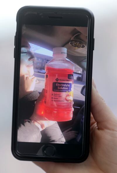 Allie Hill shows a Snapchat her friend shared showing Electrolyte Solution shortly before Hill saw an ad for Pedialyte on her Twitter feed, at the Spencer Fox Eccles Business Building at the University of Utah in Salt Lake City on Thursday, April 11, 2019