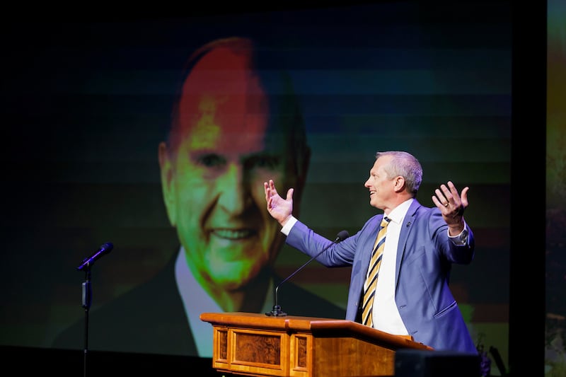 BYU vice president Keith Vorkink leads 13,702 students in singing "Happy Birthday" to President Russell M. Nelson.