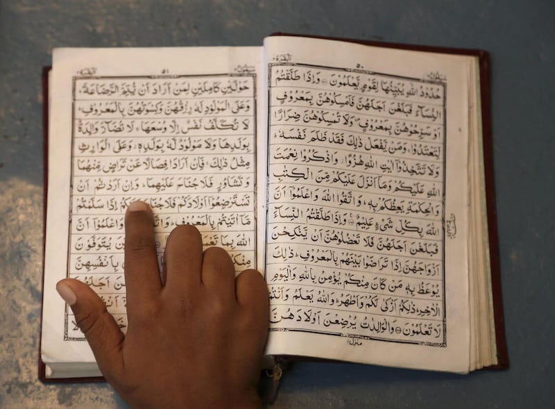 An Indian Muslim boy reads the Quran at Minhaj ul Quran school during the holy month of Ramadan in Hyderabad, India, Wednesday, June 24, 2015. Muslims throughout the world are marking the holy month of Ramadan, where observants fast from dawn till dusk.