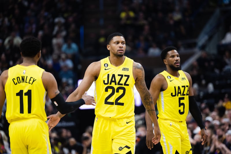 Utah Jazz forward Rudy Gay (22) high-fives teammate Utah Jazz guard Mike Conley (11) during an NBA basketball game at Vivint Arena in Salt Lake City on Friday, Feb. 3, 2023.