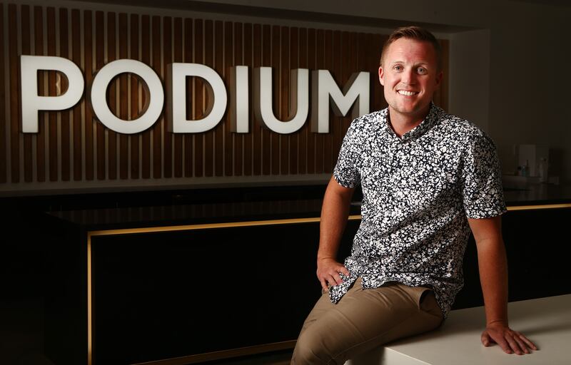 Podium CEO Eric Rea poses for a photo in the company’s front lobby in Lehi on June 26, 2017.