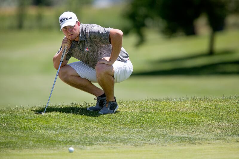 Kyler Dunkle reads the green while playing Preston Summerhays in the Utah State Amateur Championship in Oak Ridge Country Club in Farmington on Saturday, June 16, 2018. Dunkle lost to Summerhays, who became the youngest player ever to win the tournament a