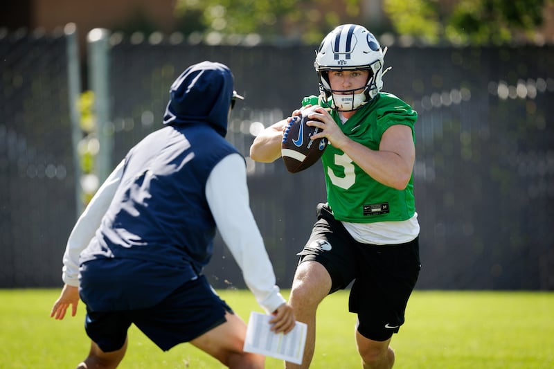 BYU quarterback McCae Hillstead scrambles during the first day of fall camp in Provo, Wednesday, July 30, 2025.