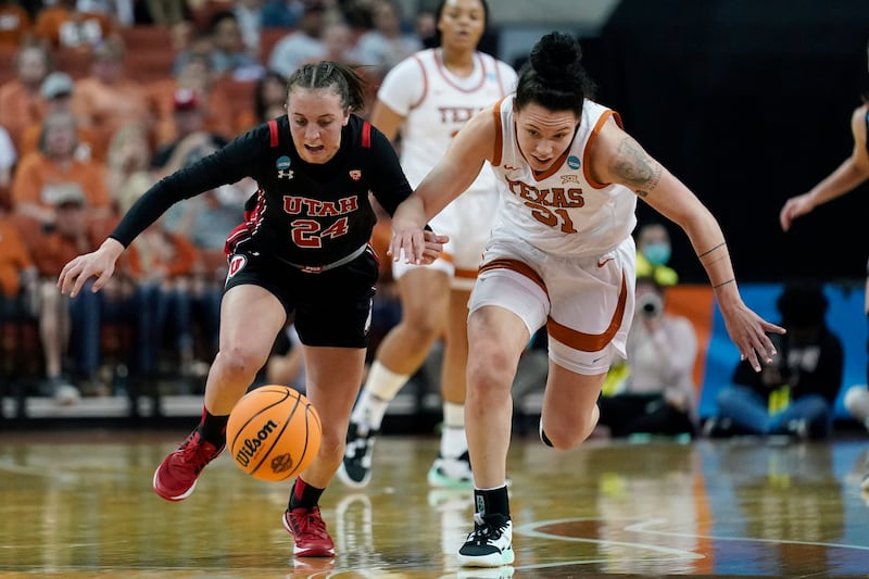 Utah guard Kennady McQueen (24) and Texas guard Audrey Warren (31) chase the ball during the first half in the second round of the NCAA women’s tournament.