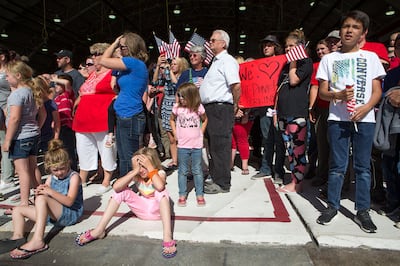 Friends and family watch as around 100 Utah National Guard soldiers are deployed to the Middle East at the Roland R. Wright Air National Guard Base in Salt Lake City on Monday, June 4, 2018.