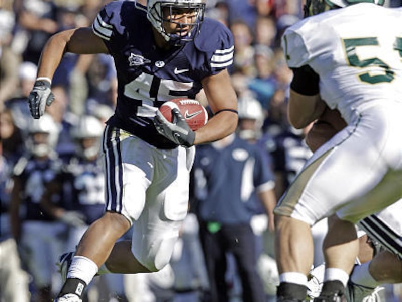 Brigham Young running back Harvey Unga originally committed to play for the University of Utah but had second thoughts a week later and signed with the Y.