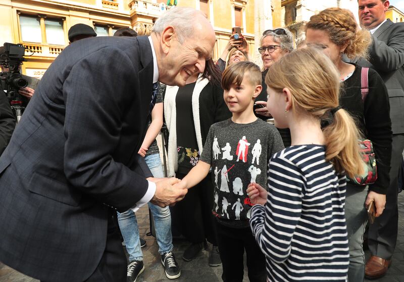 President Russell M. Nelson of The Church of Jesus Christ of Latter-day Saints pauses to talk with Ammon and Emma Schar, Basel, Switzerland, in Rome, Italy on Saturday, March 9. The Schar family is in Rome for the temple dedication.