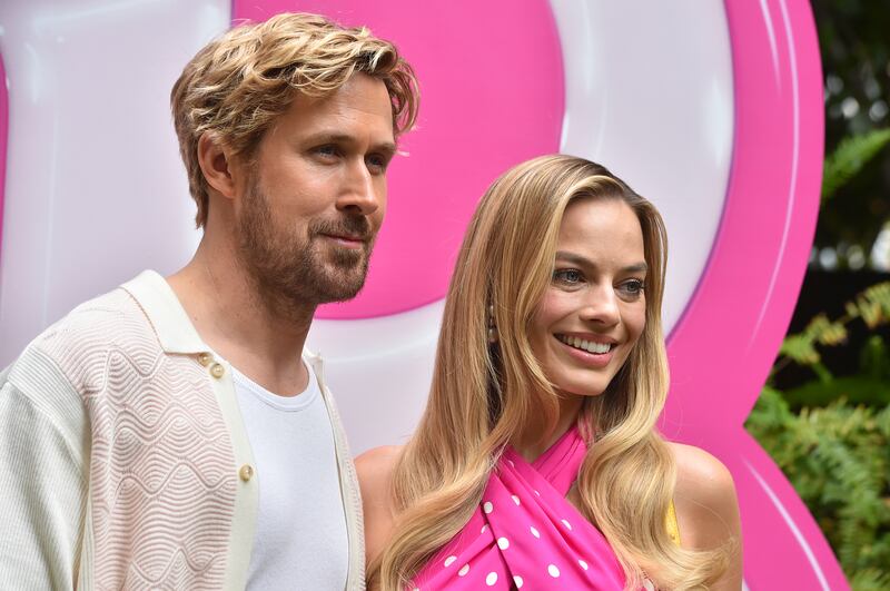 Ryan Gosling, left, and Margot Robbie arrive at a photo call for “Barbie” on June 25, 2023, in Los Angeles.