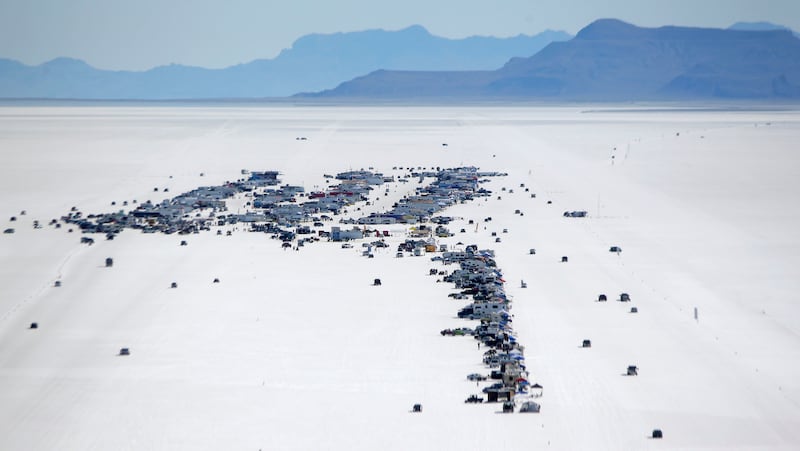 This Saturday, Aug. 13, 2016, photo, shows the pit area at the Bonneville Salt Flats, near Wendover. Speed-starved racers are finally back at Utah's world-famous Bonneville Salt Flats to hit speeds of 400 mph or more as they compete in Speed Week for the