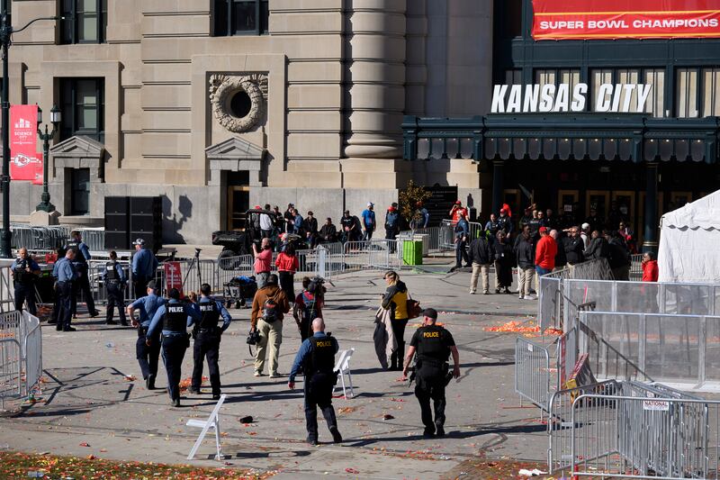 Law enforcement personnel approach Union Station following a shooting at the Kansas City Chiefs Super Bowl celebration on Feb. 14, 2024.