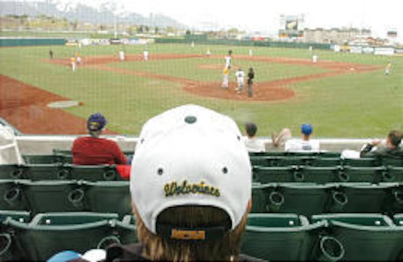 Roger Woolstenhulme watches Friday as UVSC's Wolverines play South Dakota State at the new stadium.