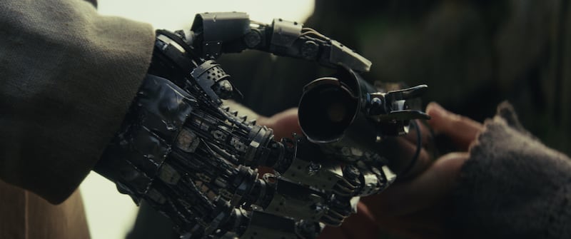 Star Wars: The Last Jedi Luke Skywalker getting lightsaber from Rey Photo: Lucasfilm Ltd. © 2017 Lucasfilm Ltd. All Rights Reserved.