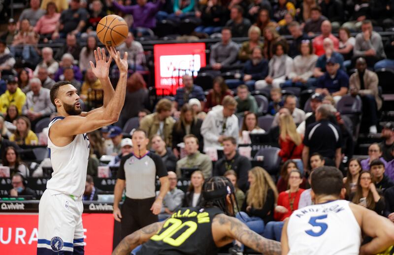 Minnesota Timberwolves’ Rudy Gobert (27) takes a free throw while playing the Utah Jazz in Salt Lake City on Friday, Dec. 9, 2022. The Timberwolves won 118-108.