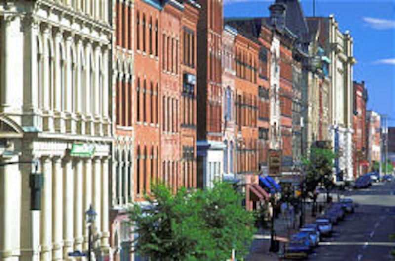 Colorful historic buildings house boutiques and restaurants in historic uptown Saint John, New Brunswick.