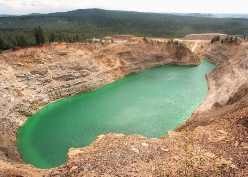 In this 1997 photo, the open pit uranium mine can be seen on the Spokane Indian Reservation near Wellpinit, Wash. The Spokane Tribe of Indians has won one battle in its long fight against uranium pollution, after a deal was reached this fall between the