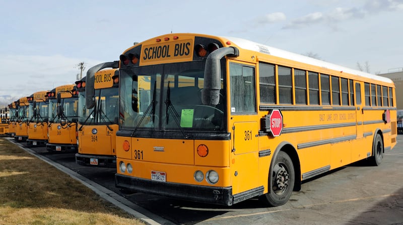 School buses are parked outside of the Salt Lake City School District’s Pupil Transportation building in Salt Lake City on Thursday, Feb. 11, 2021.