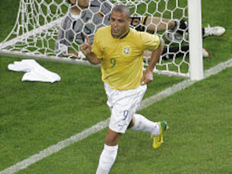 Brazil's Ronaldo celebrates his second goal of the game Thursday in a 4-1 victory that knocked the Japanese out of the World Cup.