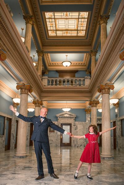Rex Kocherhans as Oliver Warbucks (Monday/Wednesday/Friday) and Madilyn Terry as Annie (Tuesday/Thursday/Saturday) strike a pose featured during a duet between Annie and Warbucks.