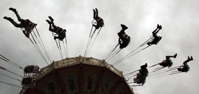Thrill seekers enjoy the Turn of the Century ride during Lagoon’s season opener in Farmington, Utah, Saturday, April 2, 2011.