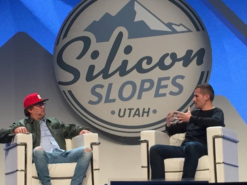 Josh James, founder and CEO of Domo, interviews popular Mormon DJ Kaskade at the Silicon Slopes tech summit in Salt Lake City on Friday.