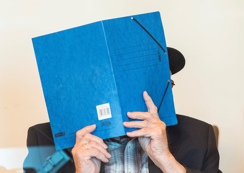 In this July 17, 2020 taken photo arrives Bruno Dey, 93-year-old former SS guard of the Stutthof concentration camp near Danzig, a courtroom in the regional court in Hamburg, Germany.