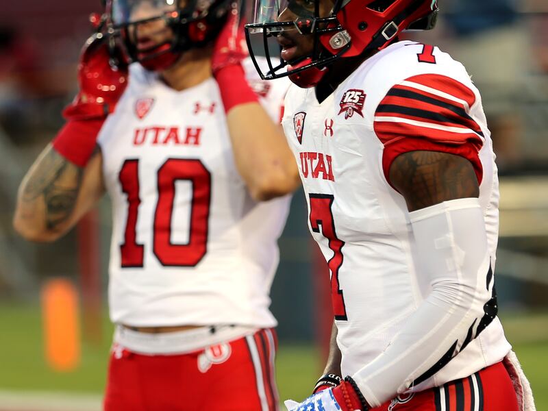 Utah Utes wide receiver Jameson Field (10) and Utes wide receiver Demari Simpkins (7) get warmed up as Utah and Stanford prepare to play a football game in Palo Alto, California, on Saturday, Oct. 6, 2018.