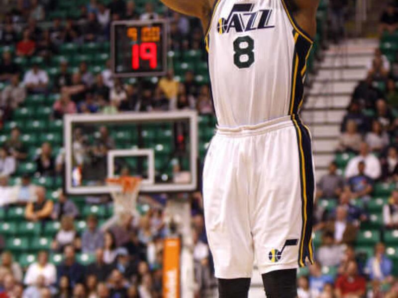 Utah Jazz point guard Randy Foye (8) shoots a 3-point-shot as the Utah Jazz play the Portland Trailblazers in NBA basketball Monday, April 1, 2013, in Salt Lake City.
