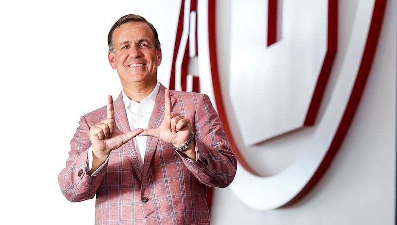 Utah athletic director Mark Harlan has signed a contract extension with the university through 2028.