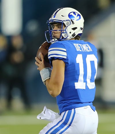 Brigham Young Cougars quarterback Koy Detmer Jr. (10) looks to pass as USU and BYU play at Maverik Stadium in Logan Utah on Friday, Sept. 29, 2017.