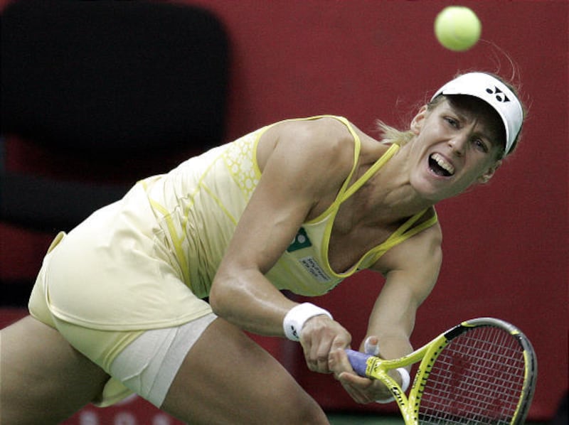 Russian Elena Dementieva returns a service to Serena Williams.