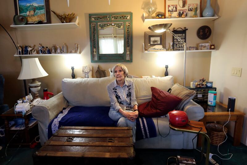 Betsy Thomas, who has advanced sleep phase syndrome, poses for a photo at her home in West Jordan on Friday, Aug. 9, 2019.