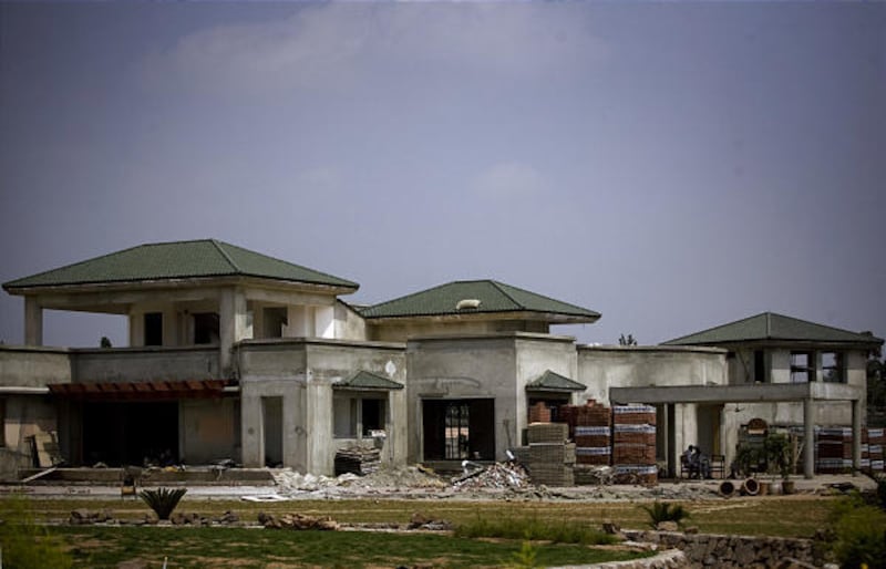 Former Pakistani President Pervez Musharraf is building this mansion in Islamabad's Chak Shahzad district. The home, on five acres, is expected to be worth about $2 million when finished. The villa is protected only by a wall of less than 6 feet in places