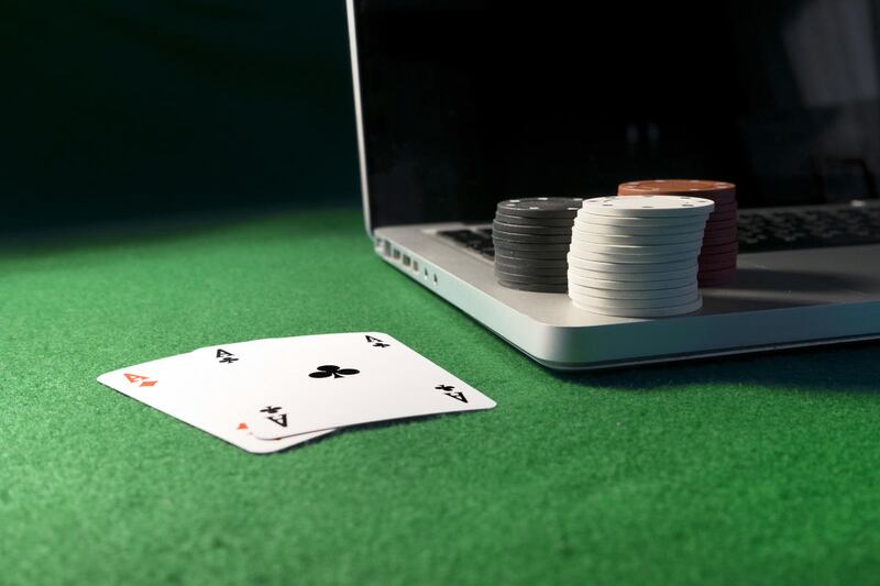 An Internet cafe business raided in January was charged in 3rd District Court with multiple gambling charges Monday.