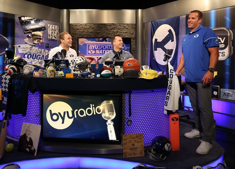 Luke Staley, right, laughs after an interview with BYU Sports Nation radio hosts Spencer Linton, left, and Jarom Jordan.