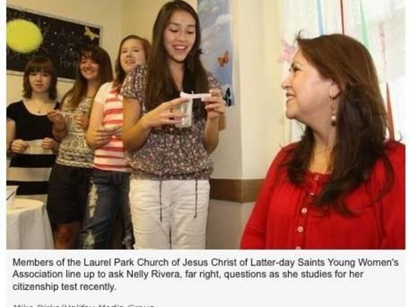 Young women from The Church of Jesus Christ of Latter-day Saints in North Carolina line up to ask Nelly Rivera, far right, questions as she studies for her citizenship test.