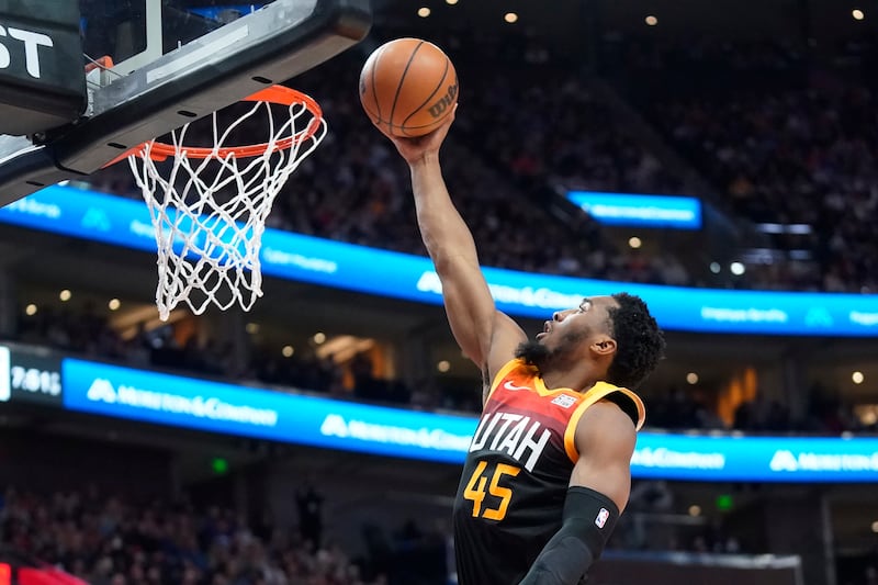 Utah Jazz guard Donovan Mitchell lays the ball up