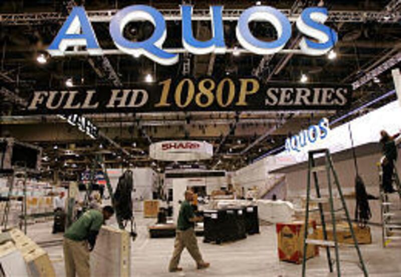The Sharp booth is shown at the Consumer Electronics Show in Las Vegas on Wednesday. With 2,700 exhibitors, the largest technology trade show in the world takes place in Las Vegas from Jan. 8 to Jan. 11. About 150,000 attendees are expected at this year's