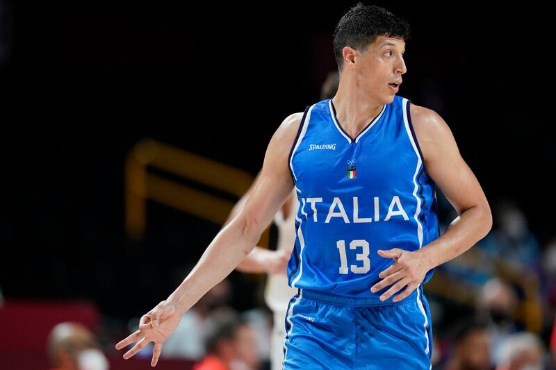 Italy’s Simone Fontecchio celebrates after making a 3-point basket during a men’s basketball preliminary round game at the 2020 Summer Olympics, Sunday, July 25, 2021, in Saitama, Japan.