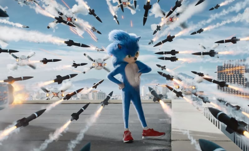 Sonic (voiced by Ben Schwartz) stands in the middle of a missile barrage in this screenshot from the "Sonic the Hedgehog" movie trailer.